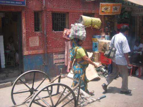 No bag?  No problem!  You'll see women in India carrying various resources like this.  I still don't know how they do it...