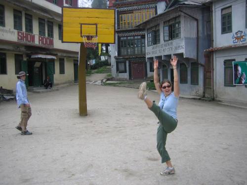 No cricket?  No problem!  We stumbled upon this basketball court in a Tibetan refugee camp.  Trip can't be seen because he was crying tears of joy.  Val on the other hand was just typically happy.