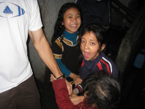 These three little girls immediately became best friends with Trip and me.  We all had about a 15 minute long dance party in the back alleys of Darjeeling until Big-Mama came out...