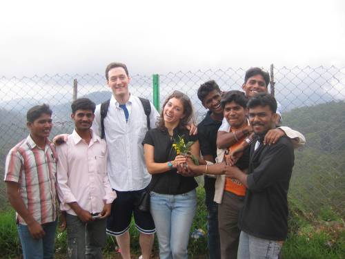 One of the many groups of people in Ooty who wanted to take a picture with us.  At least these guys were creative and they picked some flowers for Val!